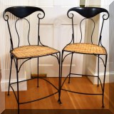 F10. Metal and woven rattan countertop height bar stools. Seats are 24&rdquo; high. 